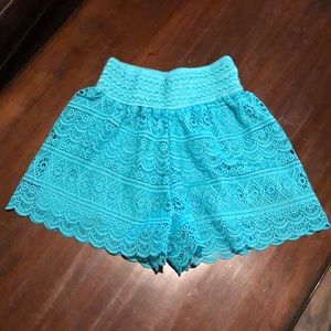 Kathy lace shorts in teal color. Tag says medium.